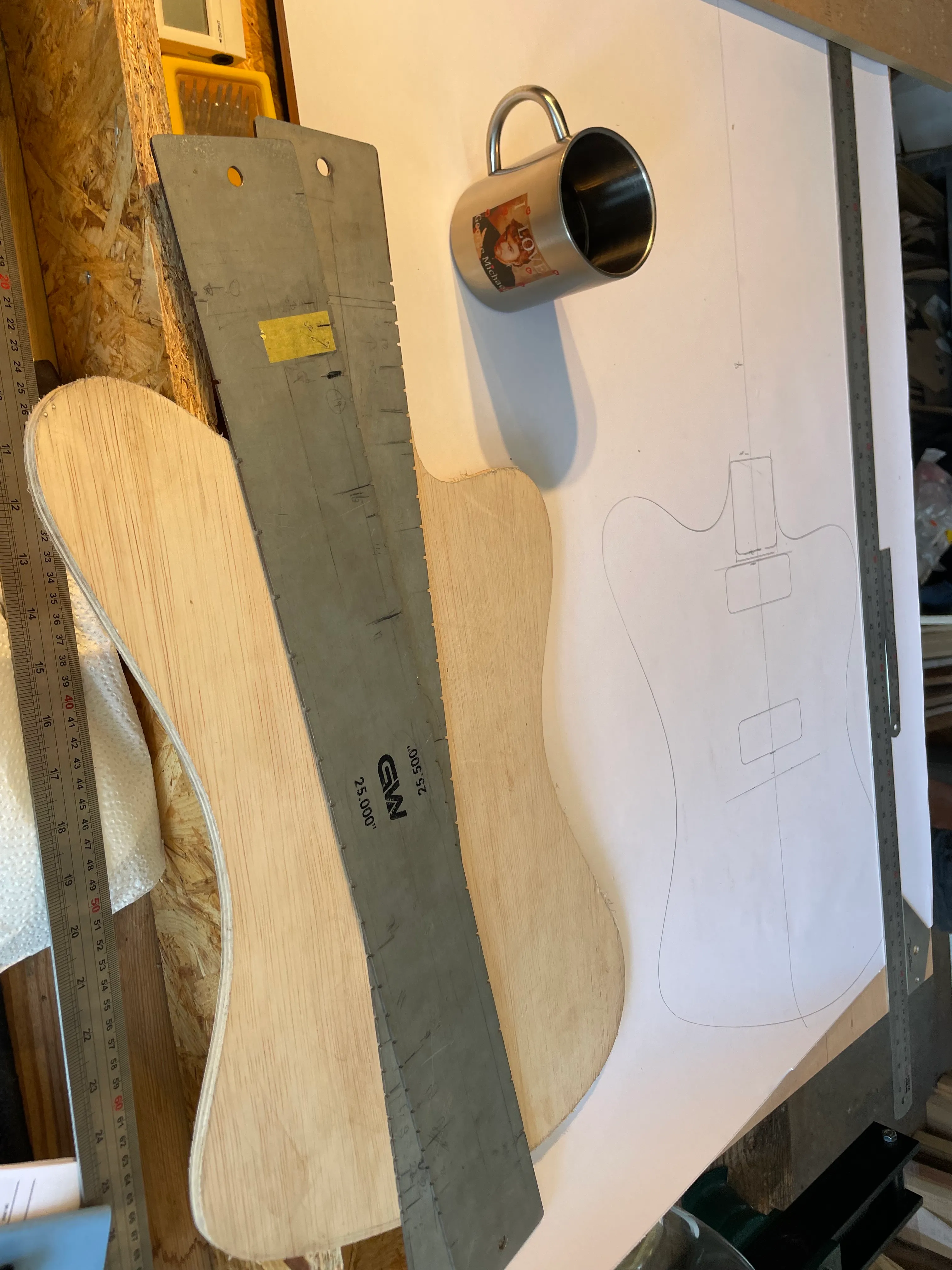 Here’s a drawing of my body on a big sheet of paper. This is when I learned how to do the layout, which is all based on the centerline, and where the neck meets the body.