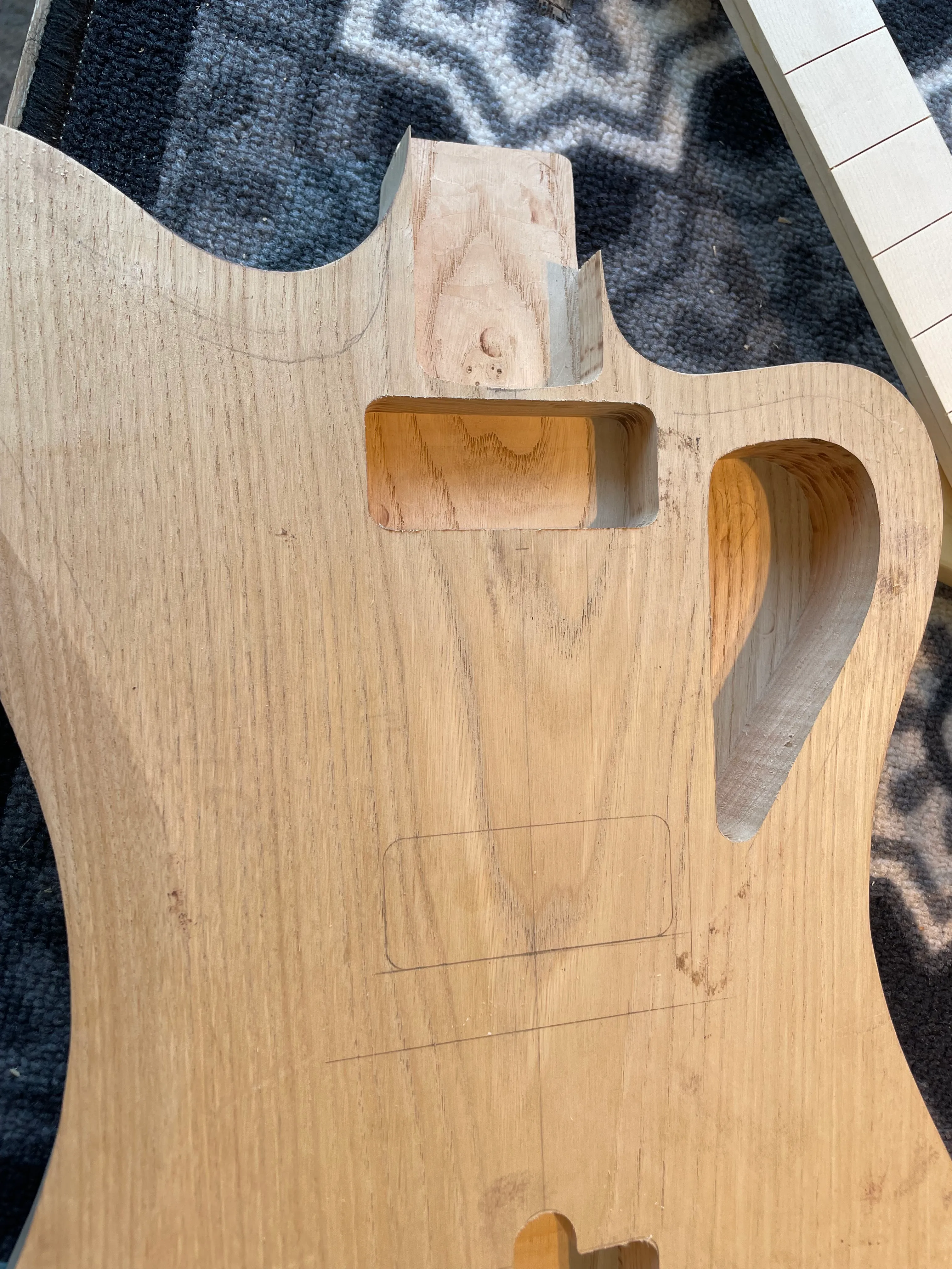 Routed the pickup cavity too close to the neck. I was going on my original drawings and hadn’t double checked. Repairable though, the plan is to CNC a plug to fit perfectly and glue it in on Monday.